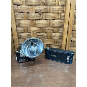 Vintage Kodak Black Camera with Reflective Flash and Case